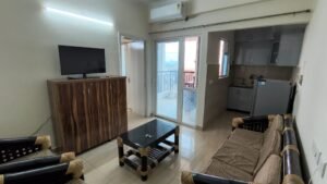 1 BHK Fully Furnished Flat for Rent in 14th Avenue Gaur City 2 living area